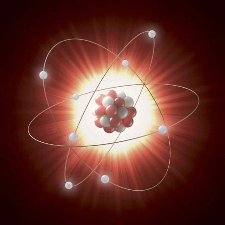 Illustration d'un noyau atomique sous la forme d'une série de cercles rouges et blancs, orbités par des électrons représentés par des cercles blancs.