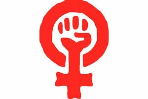 Poing en symbole féminin pour la libération des femmes